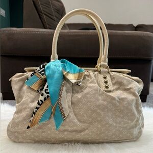 Louis Vuitton Mini Lin Trapeze GM Handbag